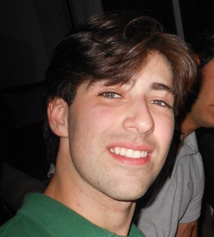 A circular photo of Gabe; links to home.